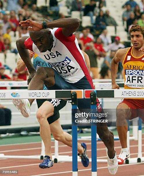 The winner at 110m hurdles race USA's Allen Johnson jumps a hurdle during the 10th IAAF World Cup at the Athens' Olympic stadium, 17 September 2006....