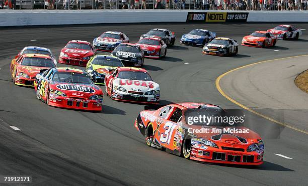 Jeff Burton, driver of the Cingular Wireless Chevrolet, leads a pack of cars during the NASCAR Nextel Cup Series Sylvania 300 on September 17, 2006...