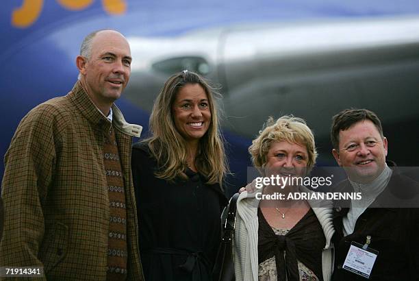 The United States Ryder Cup golf team captain Tom Lehman and his partner Melissa are met by European team captain Ian Woosnam and his partner Glen as...