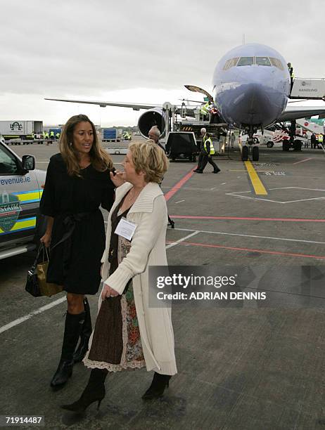 Melissa Lehman, wife of United States Ryder Cup golf team captain Tom Lehman, speaks with Glendryth Woosnam, wife of European team captain Ian...