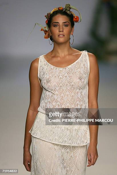 Model displays an outfit by Spanish designer Francis Montesinos, part of his Spring/Summer 2007 collection at Madrid fashion week, 18 September 2006....