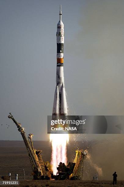 In this handout photo provided by NASA, the Soyuz TMA-9 spacecraft carrying a new crew to the International Space Station launches from the Baikonur...