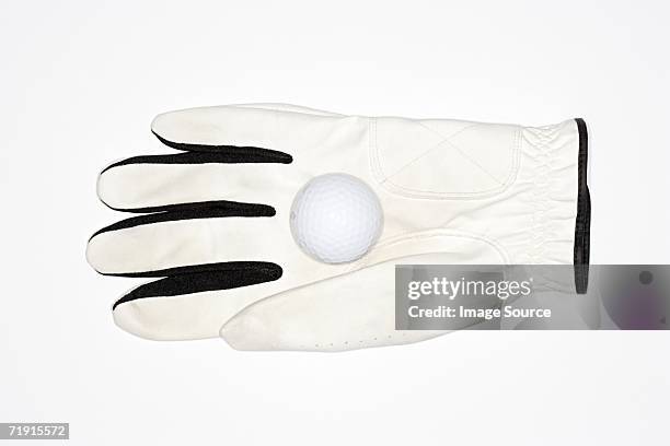 golf glove and golf ball - golfhandschuh stock-fotos und bilder