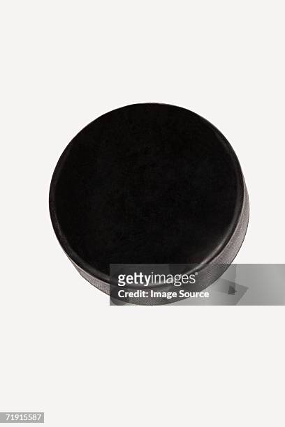ice hockey puck - hockey puck stock pictures, royalty-free photos & images