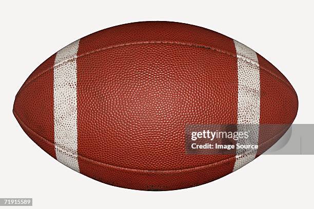 american football - american football ball studio stock pictures, royalty-free photos & images