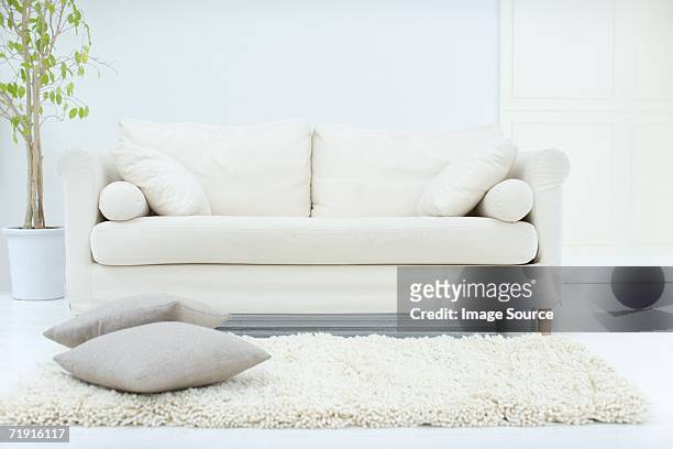 stylish living room - cushion stockfoto's en -beelden