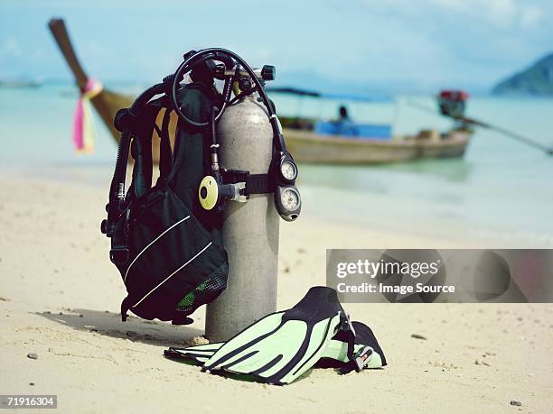 scuba tank and flippers - aqualung diving equipment stock pictures, royalty-free photos & images