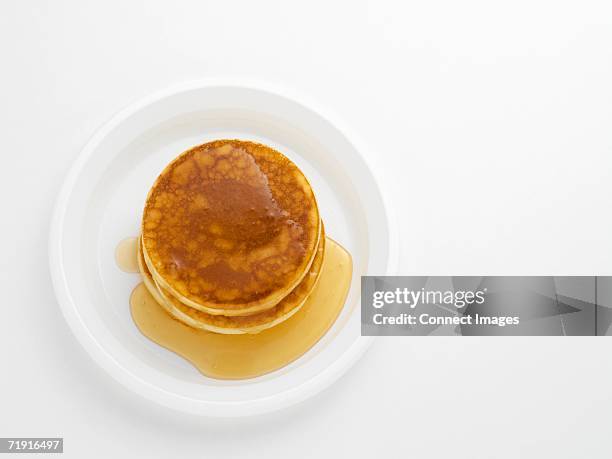 pancakes with maple syrup - syrup stock pictures, royalty-free photos & images