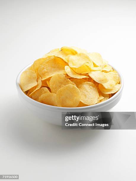 crisps - patatas fritas de churrería fotografías e imágenes de stock