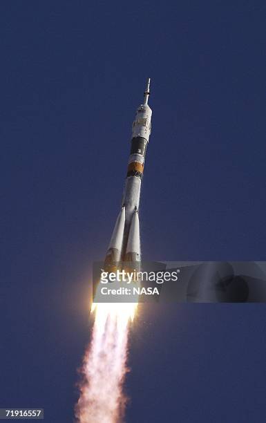 In this handout photo provided by NASA, the Soyuz TMA-9 spacecraft carrying a new crew to the International Space Station launches from the Baikonur...