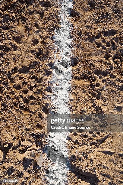 chalk line on a baseball field - bodyline stock pictures, royalty-free photos & images