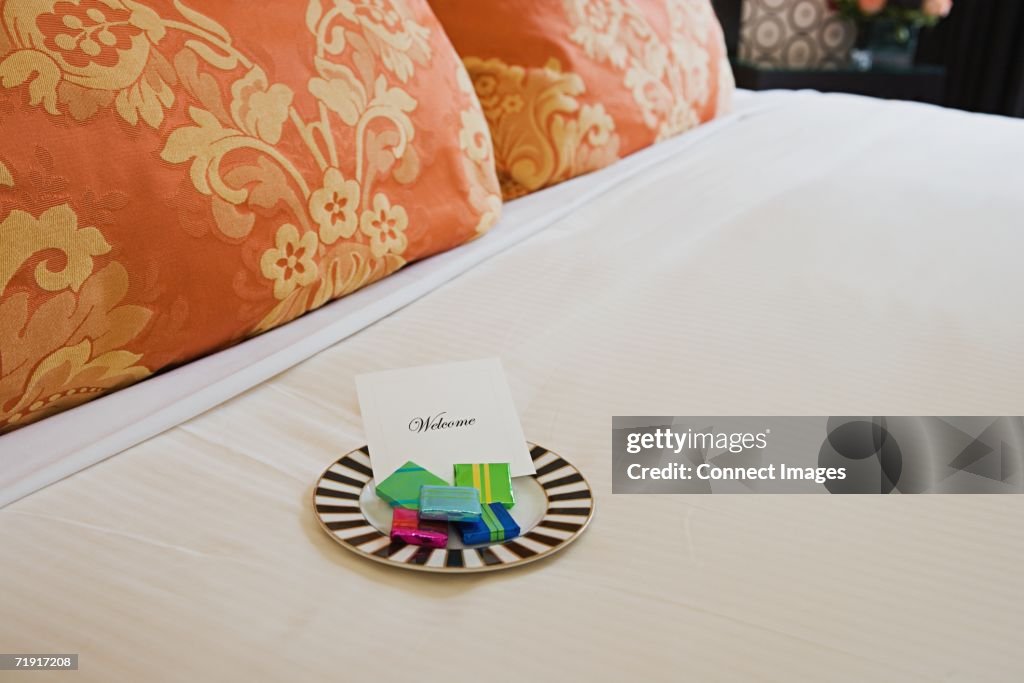 Sweets on a hotel bed