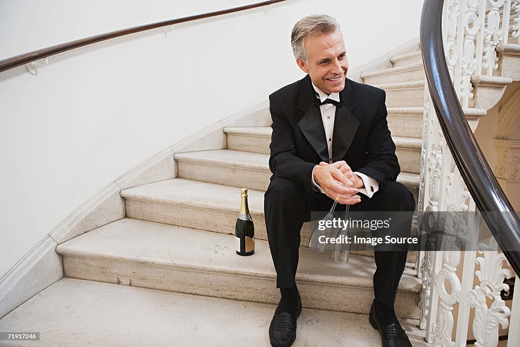 Man in tuxedo with champagne