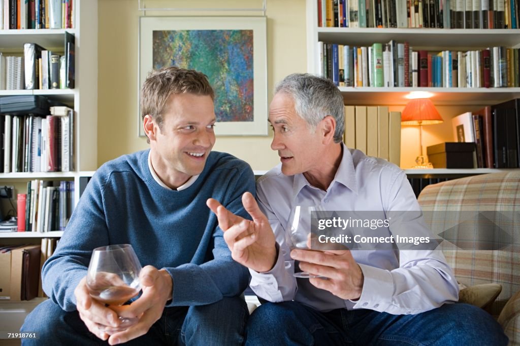 Senior man giving advice to younger man