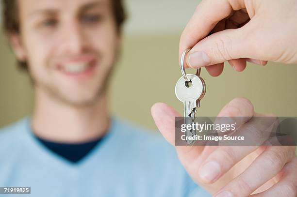 man taking keys - handing over keys bildbanksfoton och bilder