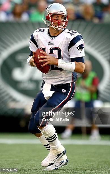 Quarterback Tom Brady of the New England Patriots makes a pass in the pocket during the game against the New York Jets on September 17, 2006 at...