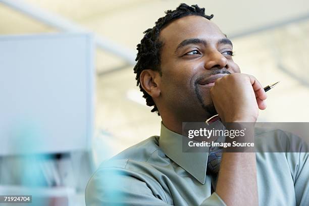 smiling male office worker - smug stock pictures, royalty-free photos & images