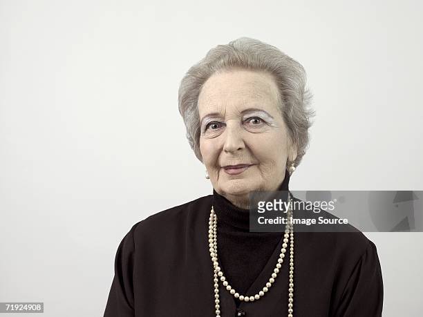 portrait of a senior woman - fashion glamour pearl stock pictures, royalty-free photos & images