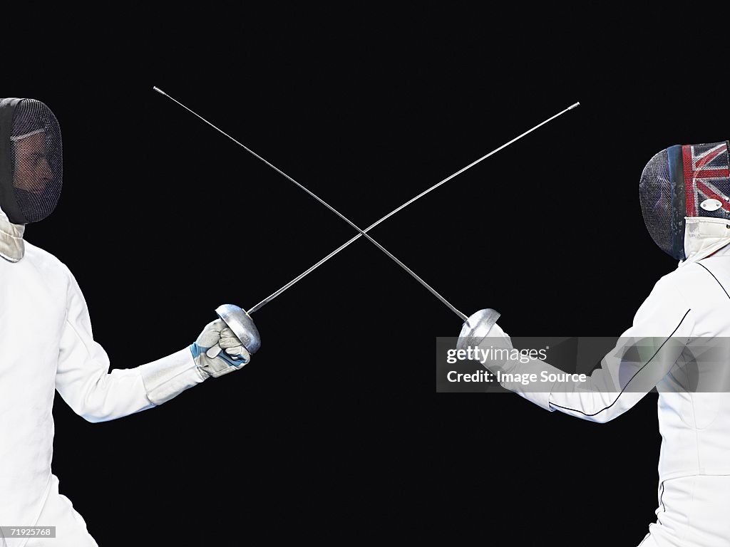 Fencers crossing foils