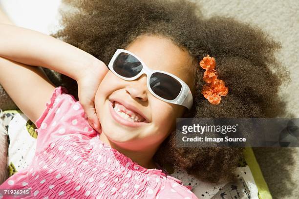 girl wearing sunglasses - spotted gum stock pictures, royalty-free photos & images
