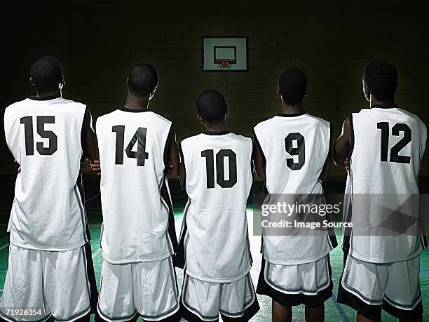 rear view of basketball team - uniforme di basket foto e immagini stock