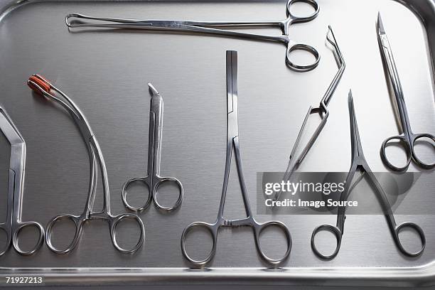 tray of surgical scissors - surgical tray stock pictures, royalty-free photos & images