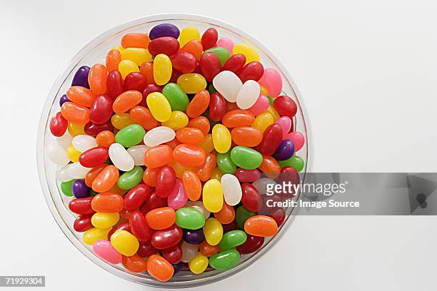 bowl of jellybeans - coinfeitos imagens e fotografias de stock