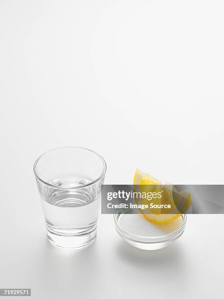tequila lemon and salt - tequila shot stock pictures, royalty-free photos & images