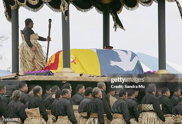 Pallbearers carry the Late King Taufa'ahau Tupou IV and Royal undertaker Lauaki from the Palace to the Mala'e Kula burial site during the State...