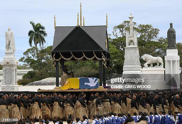 The casket holding the body of Tonga's King Taufa'ahau Tupou IV, arrives at the royal burial grounds in Nuku'alofa, 19 September 2006. Topou IV died...