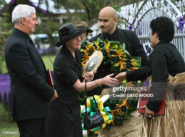 Australian Governor General Michael Jeffery and Mrs Jeffery are met as they arrive for the state funeral of Tonga's King Taufa'ahau Tupou IV at the...
