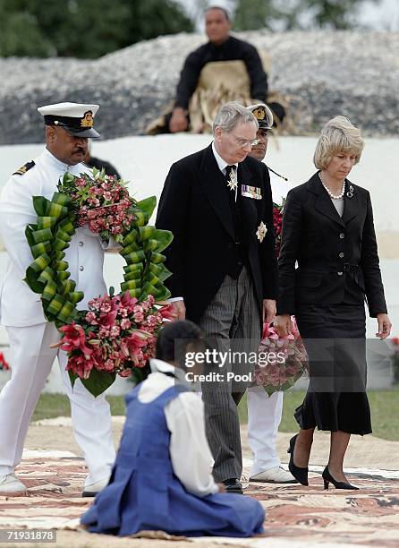 The Duke and Duchess of Gloucester deliver a wreath for the tomb for the tomb of the late King Taufa'ahau Tupou IV at his state funeral on September...