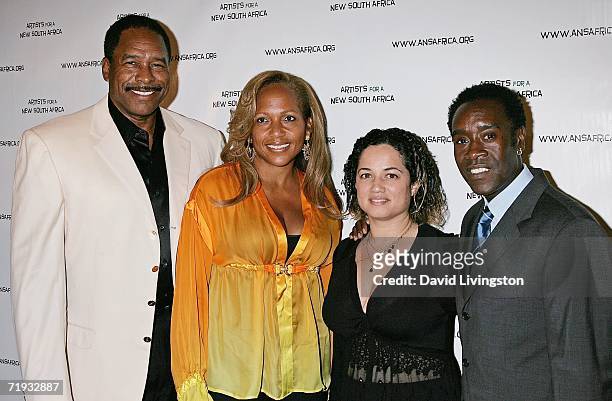 Baseball great Dave Winfield, his wife Tonya, actress Bridgid Coulter and actor Don Cheadle attend Archbishop Desmond Tutu's 75 birthday gala...