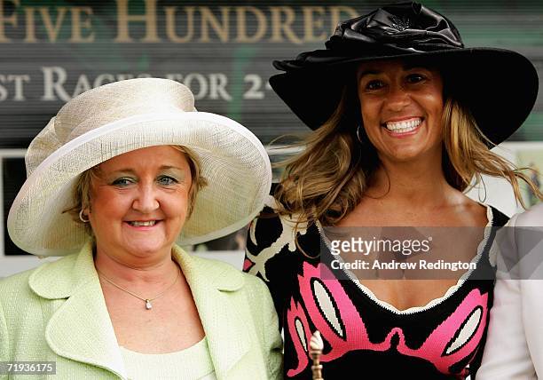 Melissa Lehman , wife of Tom Lehman and Glendryth Woosnam wife of Ian Woosnam smile during the Ryder Cup Wives Race Day at The Curragh racecourse on...