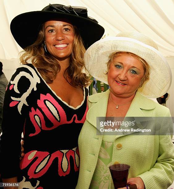 Melissa Lehman , wife of Tom Lehman and Glendryth Woosnam wife of Ian Woosnam smile during the Ryder Cup Wives Race Day at The Curragh racecourse on...