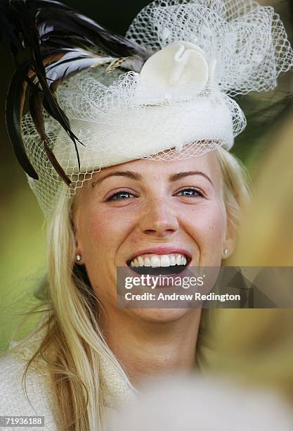 Paul Casey's girlfriend Jocelyn Hefner smiles as USA and European team wives prepare to travel to The Curragh racecourse for the Wives Race Day prior...