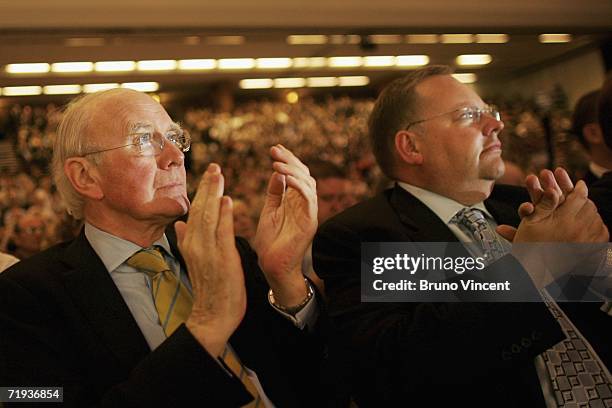 Party Leader, Sir Menzies Campbell and Lord Rennard applaud former leader of the Liberal Democrats, Charles Kennedy during his speech to delegates on...