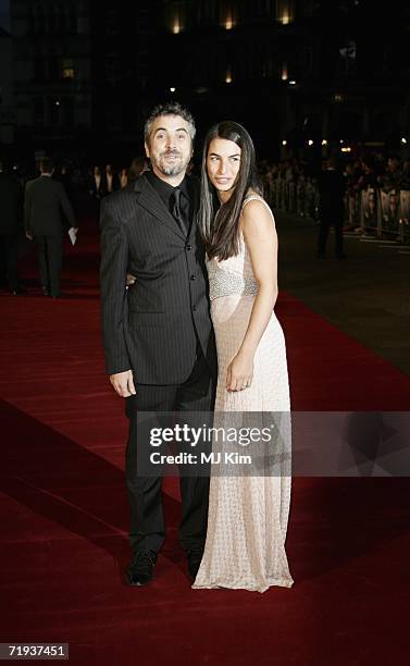 Director Alfonso Cuaron and wife Annalisa Bugliani arrive at the UK premiere of "Children of Men" held at the Odeon in Leicester Square on September...