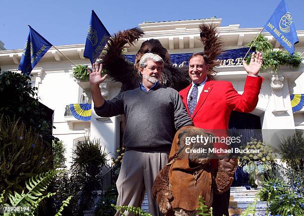 Tournament of Roses President Paul Holman with Filmmaker George Lucas and his "Star Wars" characters Wicket the Ewok and Chewbacca attend the...