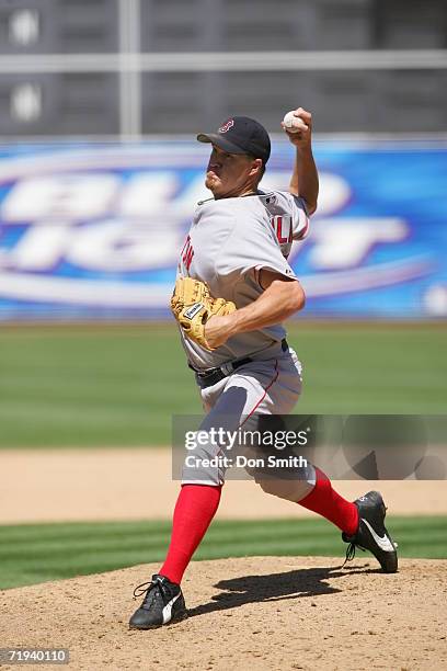 Mike Timlin of the Boston Red Soxs pitches during the game against the Oakland Athletics at the Network Associates Coliseum in Oakland, California on...
