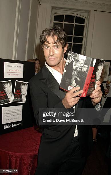 Rupert Everett poses at his book launch for "Red Carpets and Other Banana Skins" at Dartmouth House September 19, 2006 in London, England.