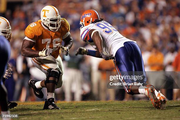 Defensive end Ray McDonald of the University of Florida Gators covers offensive guard Arron Sears of the University of Tennessee Volunteers during...