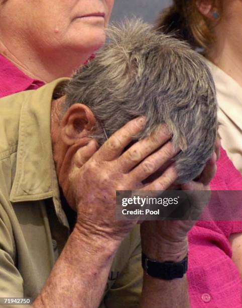 Bob Irwin, father of Australian environmentalist and television personality Steve Irwin hold his head at a memorial service for his son at Australia...