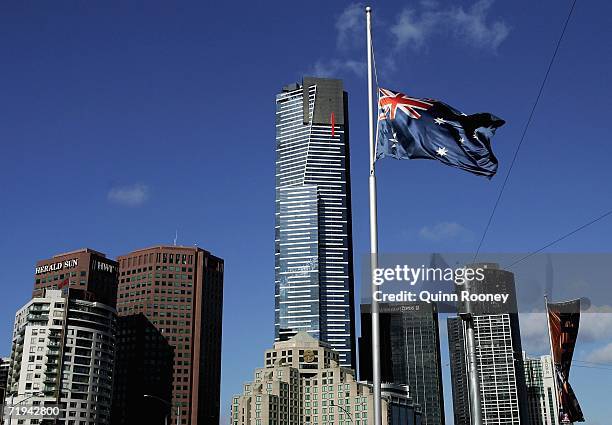 An Australian flag flies at half mast during the telecast of the Steve Irwin memorial service from Beerwah at Federation Square September 20, 2006 in...