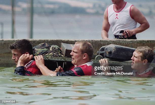 Martin Corry, Will Green and Mike Tindall of the England rugby team training with the Royal Marines at Lympstone, Devon, 28th July 1999.