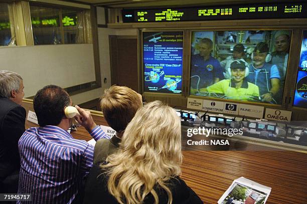 Hamid Ansari talks on the phone with his wife, Anousheh Ansari, during her first moments onboard the International Space Station, on September 20,...