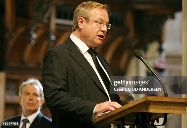 Trevor Lakin, from Lincolnshire, who lost his son Jez in the Sharm-el-Sheik bombings last year, reads from the bible during a memorial service at...