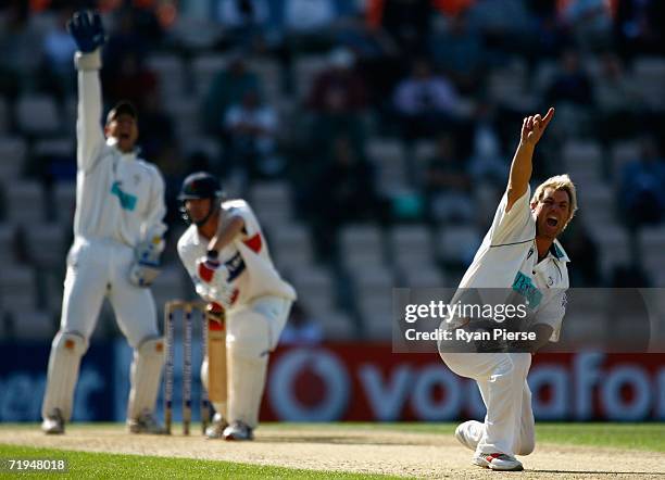 Shane Warne of Hampshire appeals for a wicket during day one of the Liverpool Victoria Insurance County Championship match between Hampshire and...