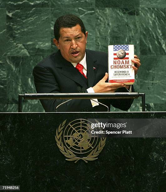 Venezuelan President Hugo Chavez holds up a book by Noam Chomsky "Hegemony or Survival: America's Quest for Global Dominance " while addressing the...