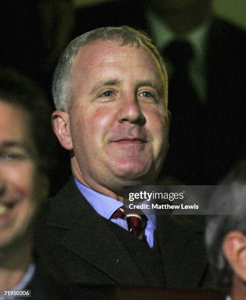 Randy Lerner, the new Chairman of Aston Villa watches his new team during the Carling Cup Second round match between Scunthorpe United and Aston...